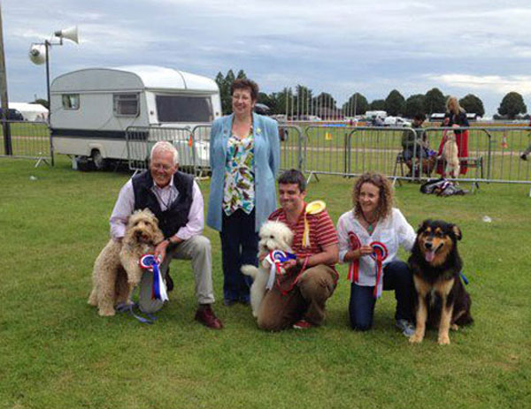 proud dog owners who have won rosettes