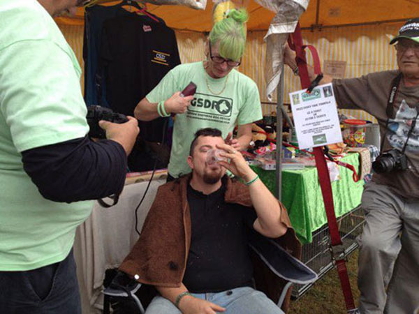 damon taking a stiff drink before the charity head shave