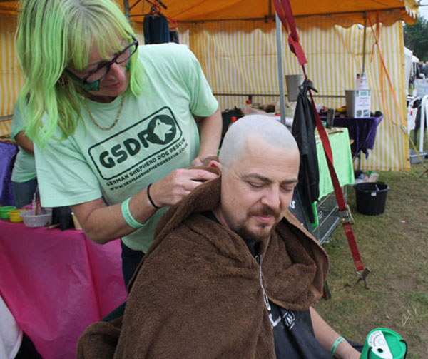 damon with his head shaved