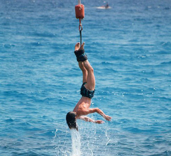 bungee jumper getting his hair wet