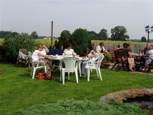 enjoying the sun and the coffee and cakes