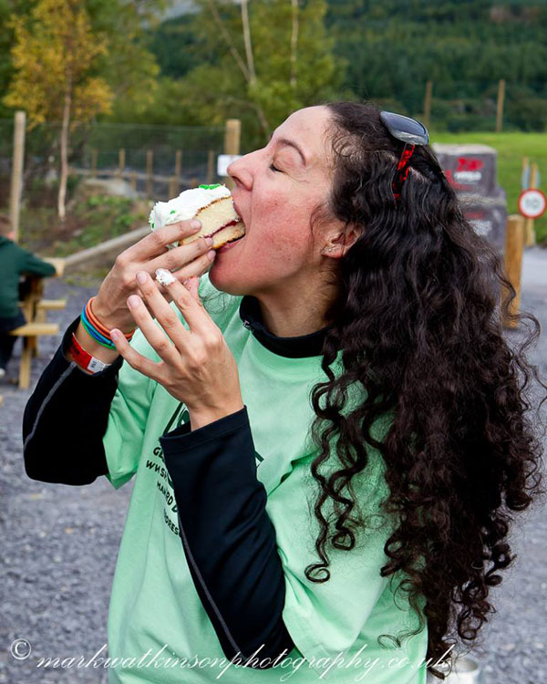 carla eating a big piece of sponge cake