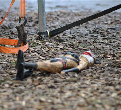 toy doll lying on the ground