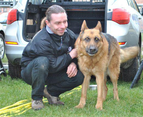 Mark, gsdr volunteer with his other dog Scooby