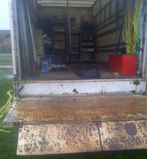 sleeping in the back of a wet muddy van
