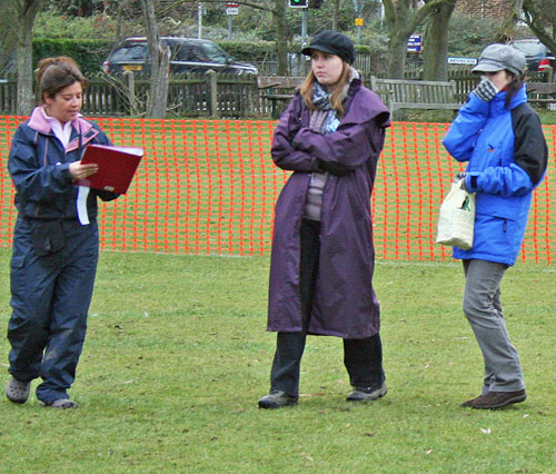 people standing waiting for their turn in the show ring 