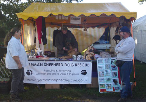 people manning the stand