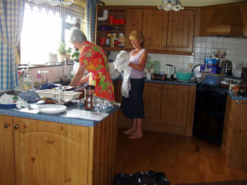 the kitchen staff clearing up