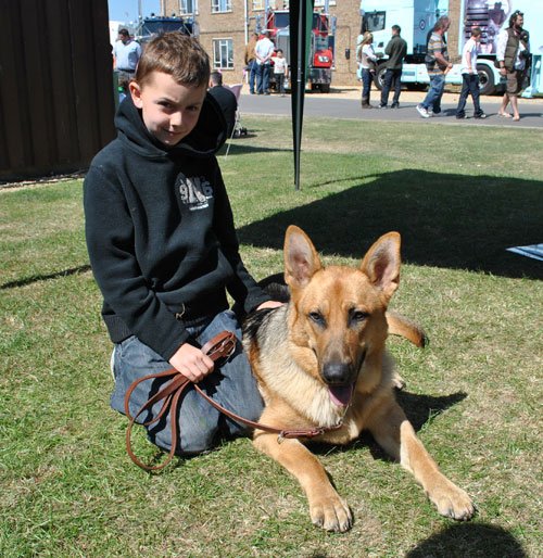 young boy with olly the gsd